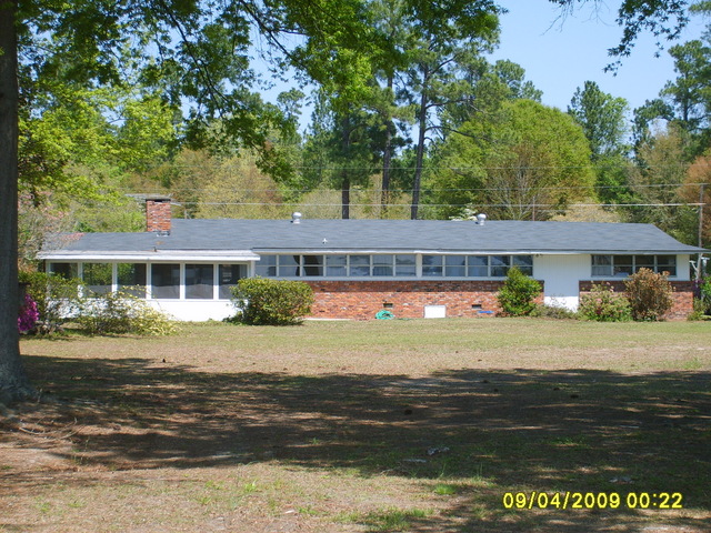 Waterside view of house